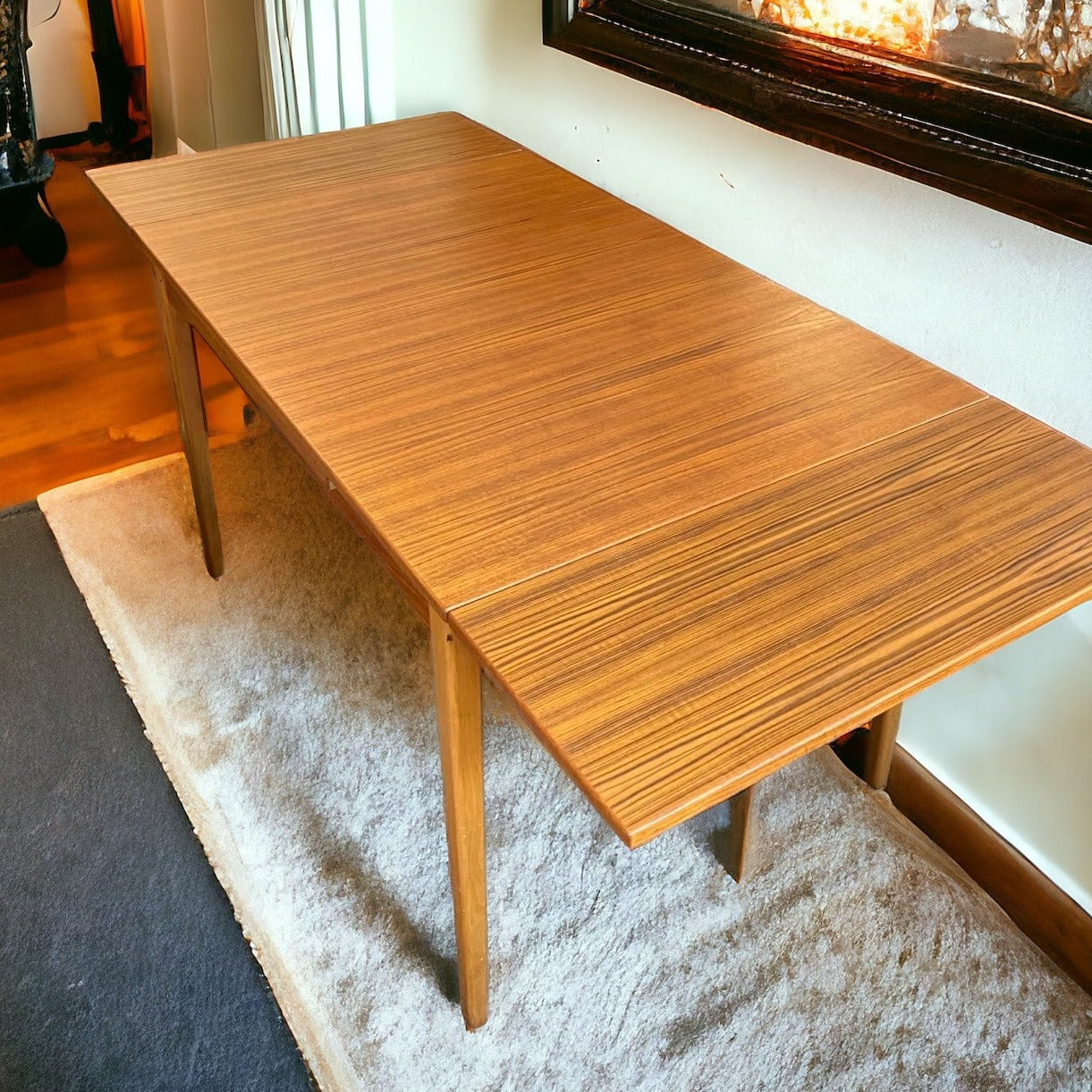 <p>Bordet är så konstruerat så att du kan bara dra ut en skiva om du inte behöver den fulla längden av bordet.
