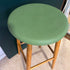 Sitsen på pallen har varsamt målats om med Capability Green från Annie Sloan Chalk Paint – en mjuk, naturlig grön ton.